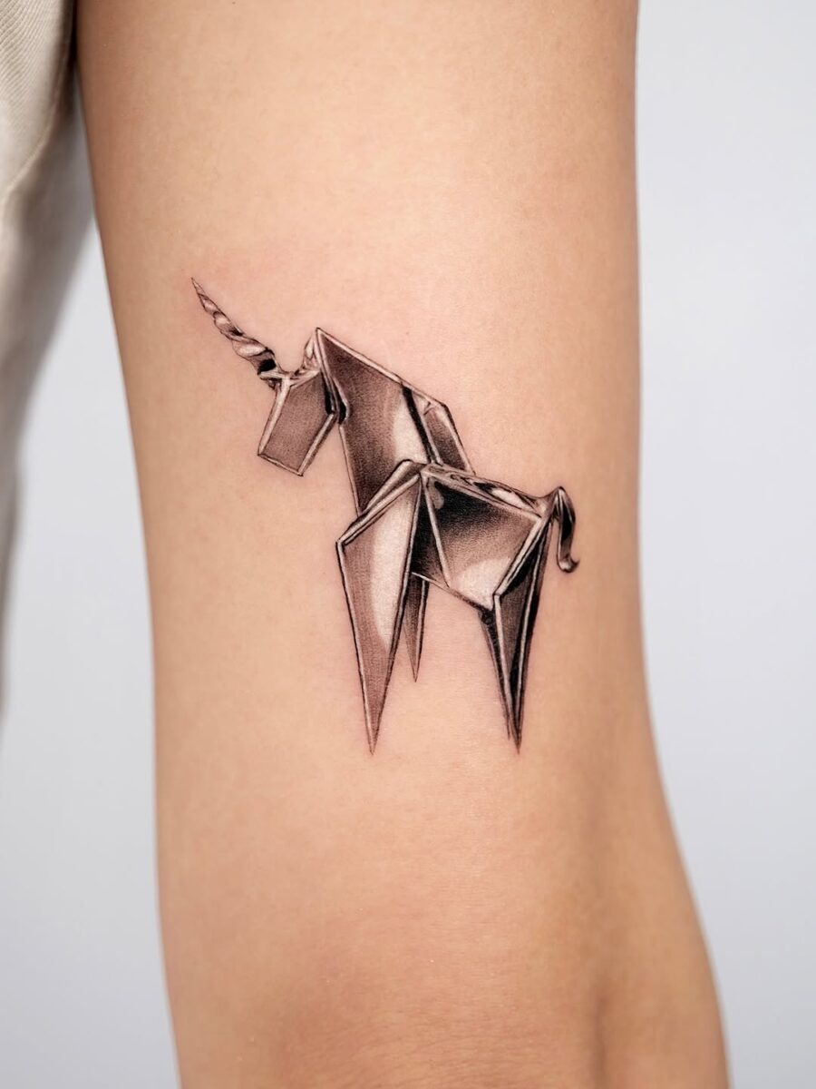 Whimsical origami unicorn in silver ink Tattoo Design
