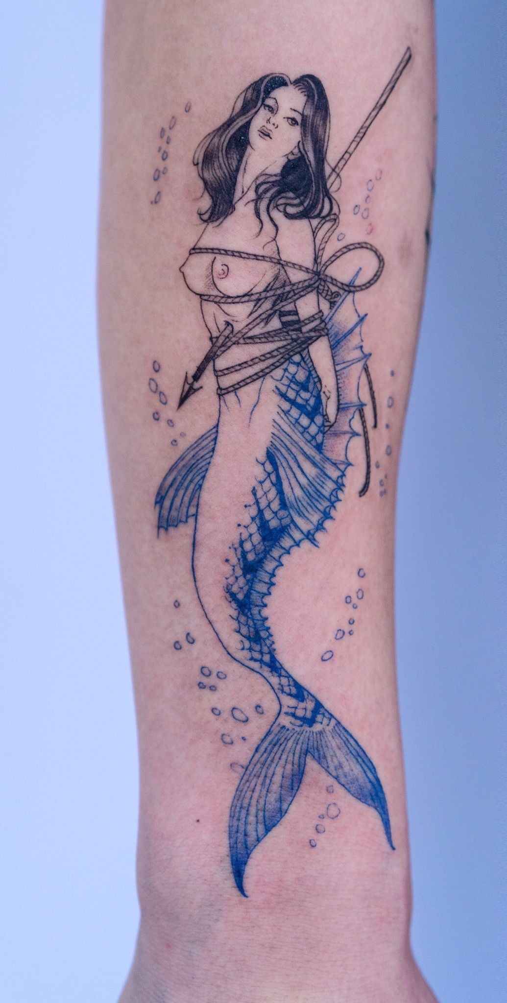 Blue Ink Bound Siren Illustration, a tattoo design rendered in clean detailed linework.