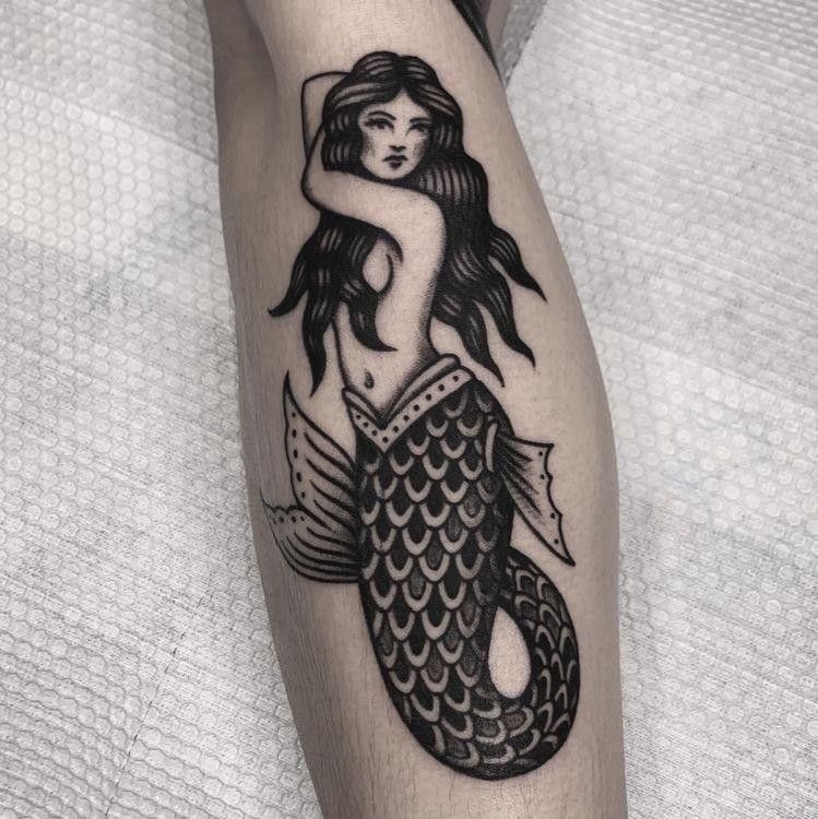 Classic Black Traditional Siren Curve, a tattoo design rendered in bold for the leg.