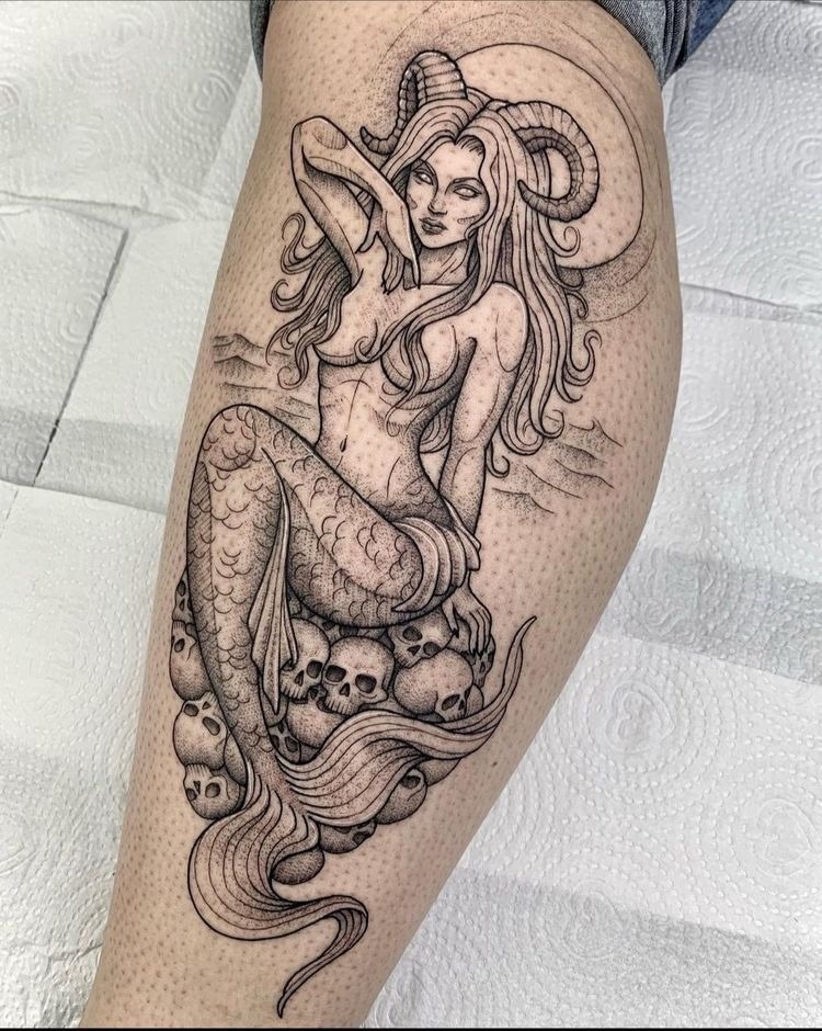 Dark Siren with Horns and Skull Base, a tattoo design rendered in bold traditional.