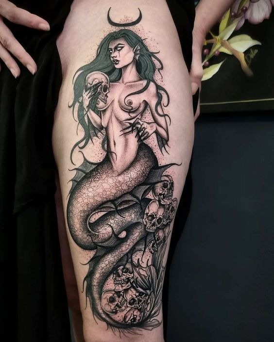 Gothic Siren with Skulls and Crescent Crown, a tattoo design rendered in clean detailed linework for the leg.