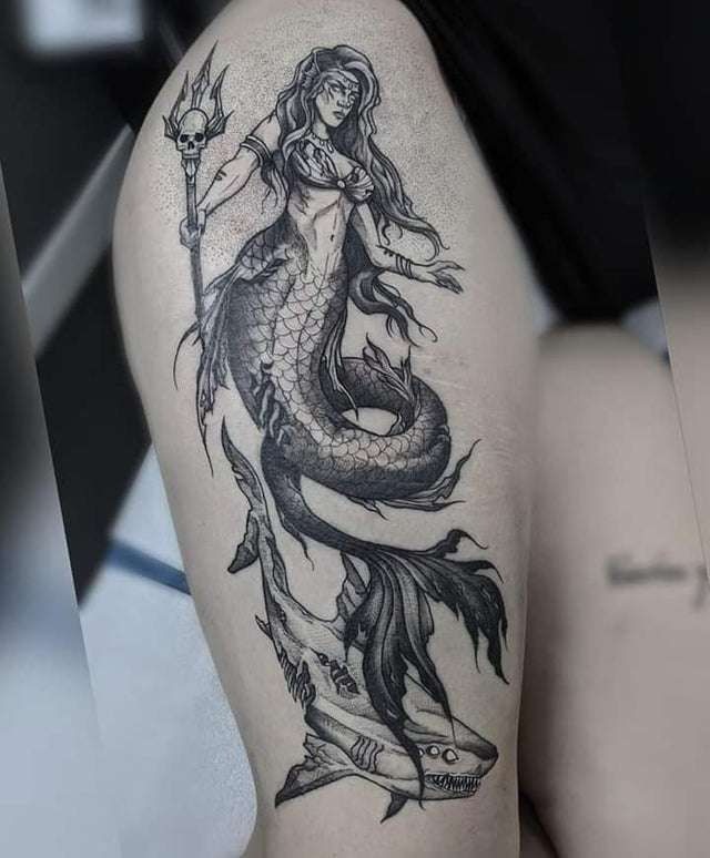 Warrior Siren with Trident and Sea Creature, a tattoo design rendered in bold traditional.