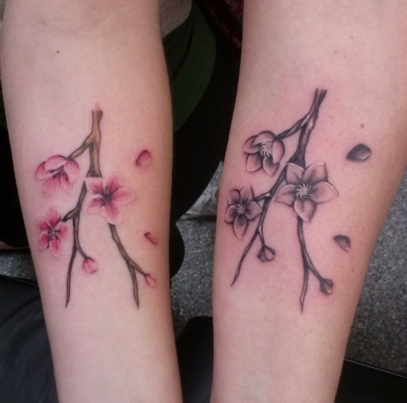 Pink and Black Matching Flower Tattoos Tattoo Design
