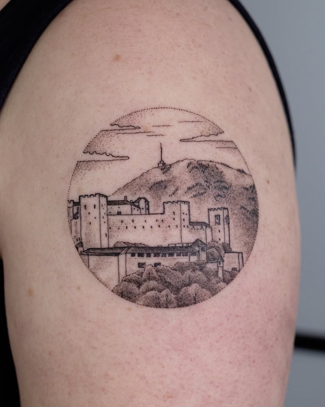 Circular skyline tattoo featuring a mountain view. Tattoo Design