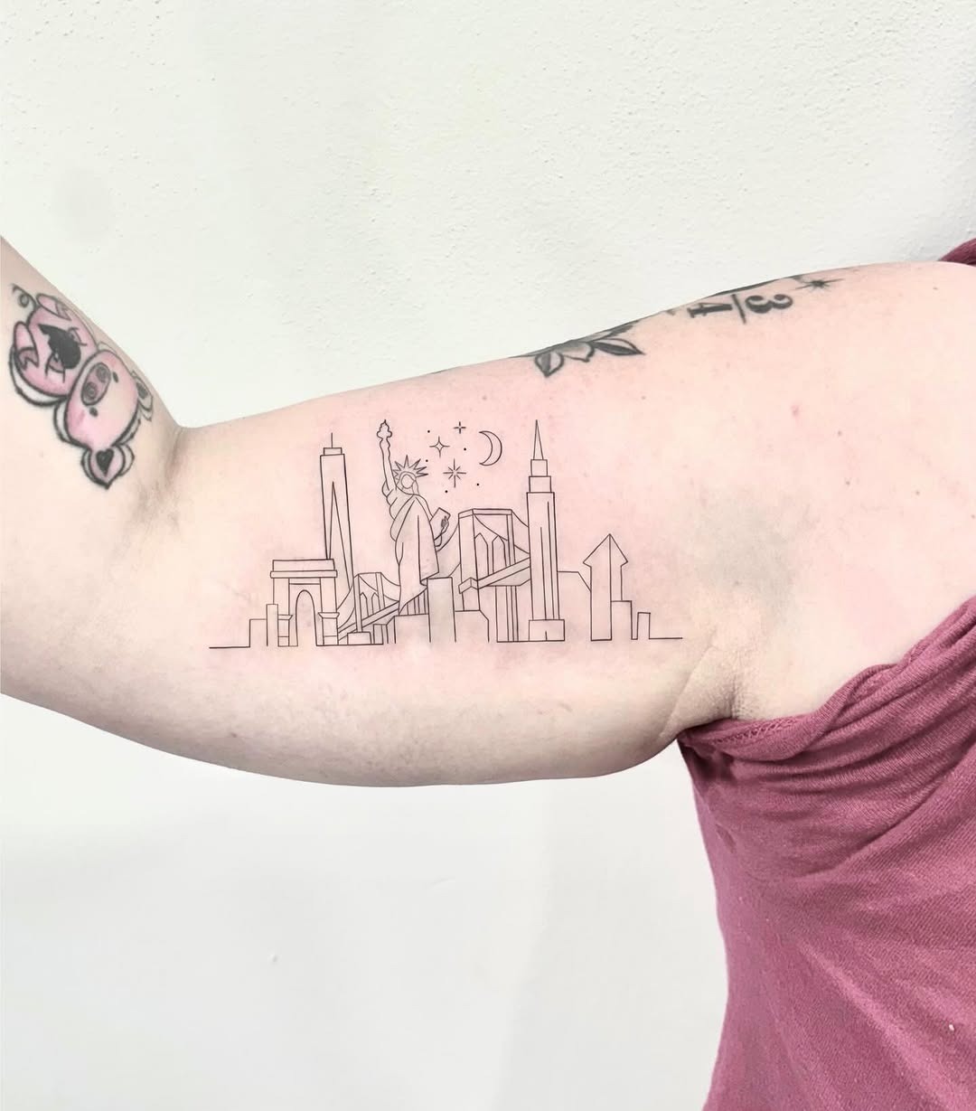Elegant skyline tattoo featuring iconic landmarks Tattoo Design