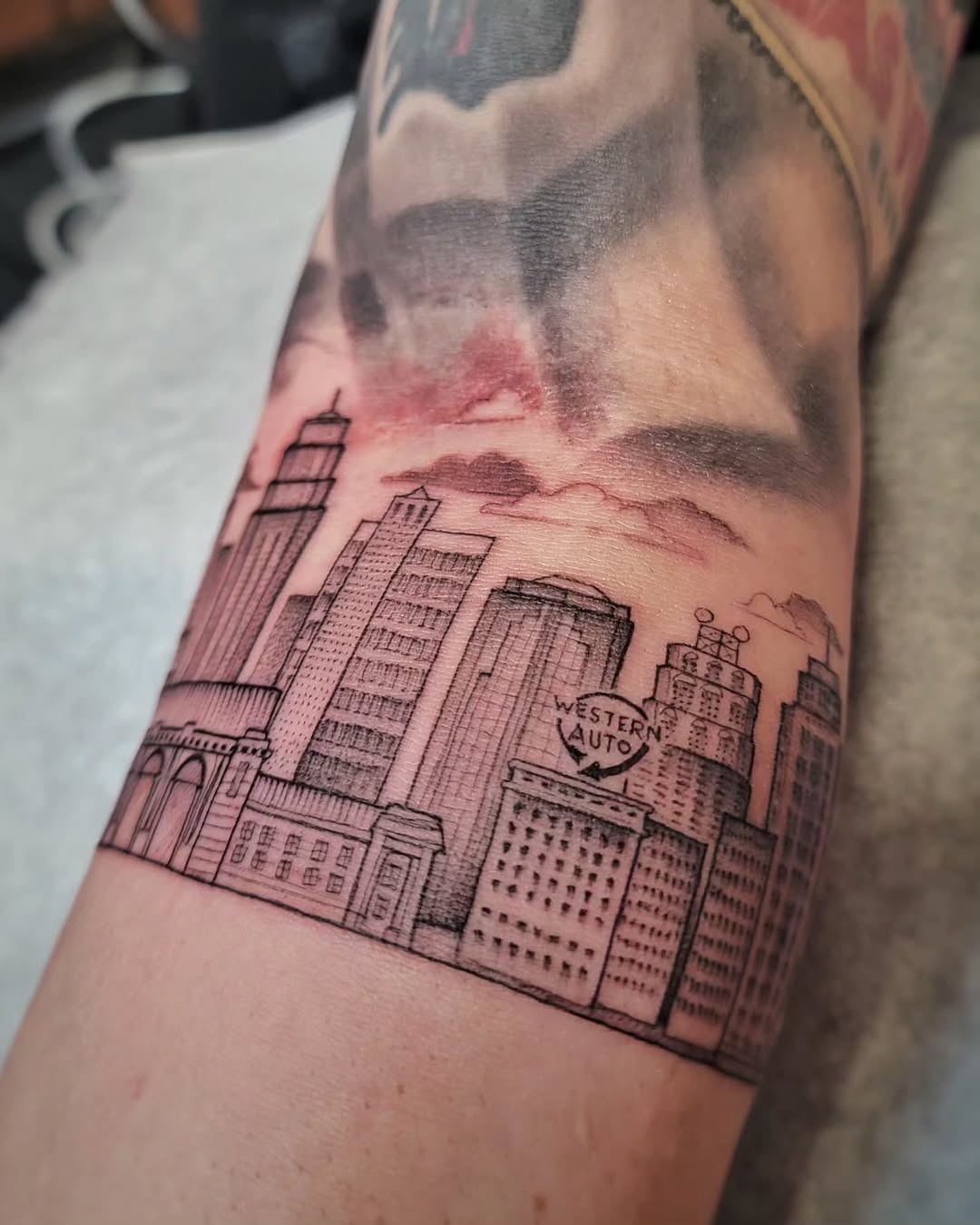 Intricate skyline tattoo in detailed linework Tattoo Design
