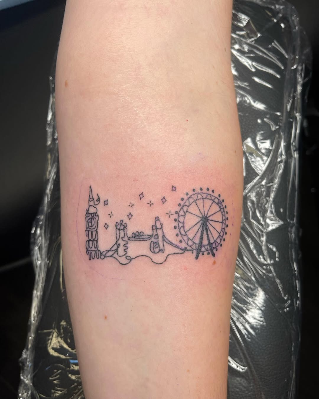 Minimalist skyline tattoo with iconic landmarks Tattoo Design