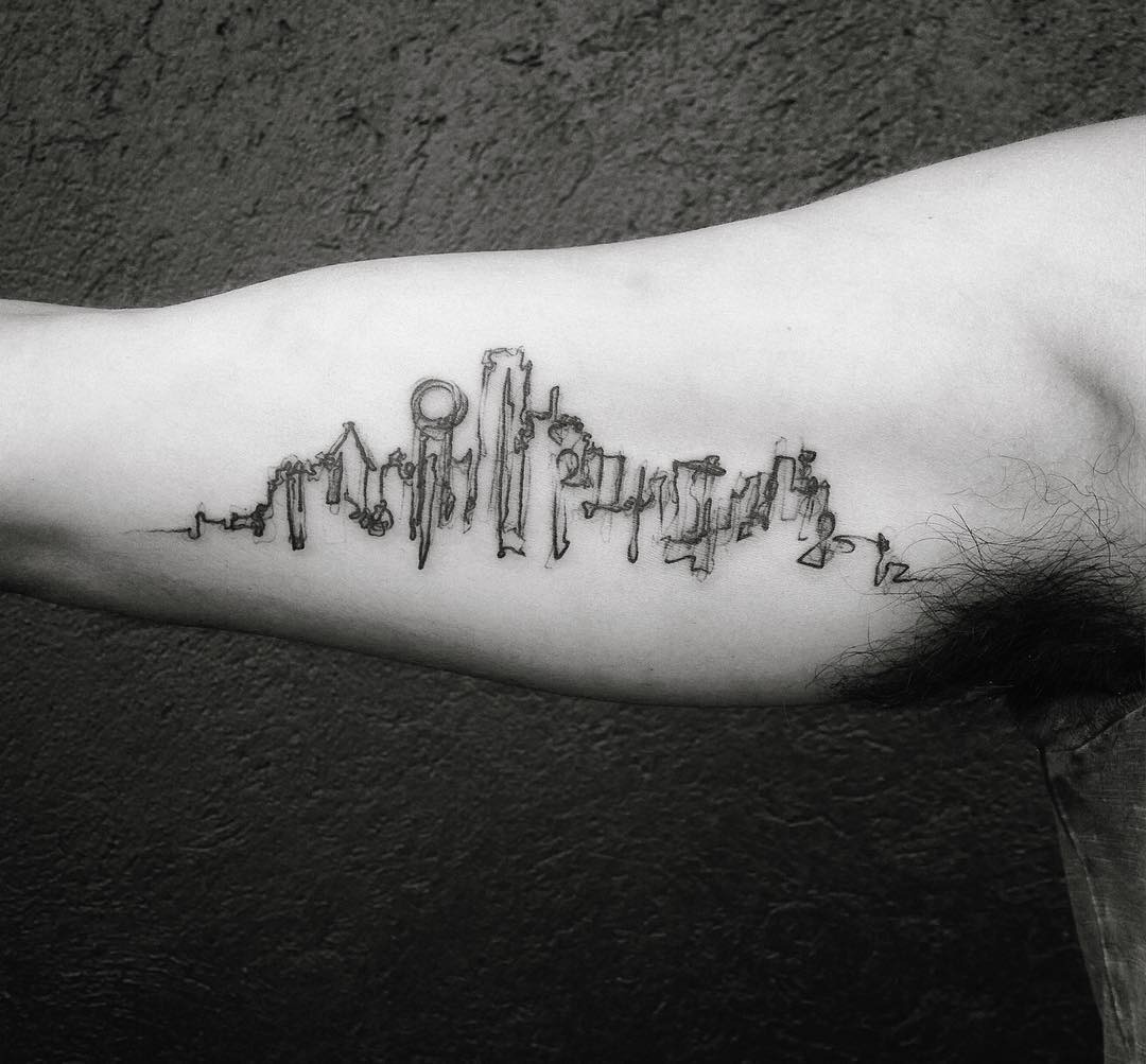 Minimalist skyline tattoo with urban flair Tattoo Design