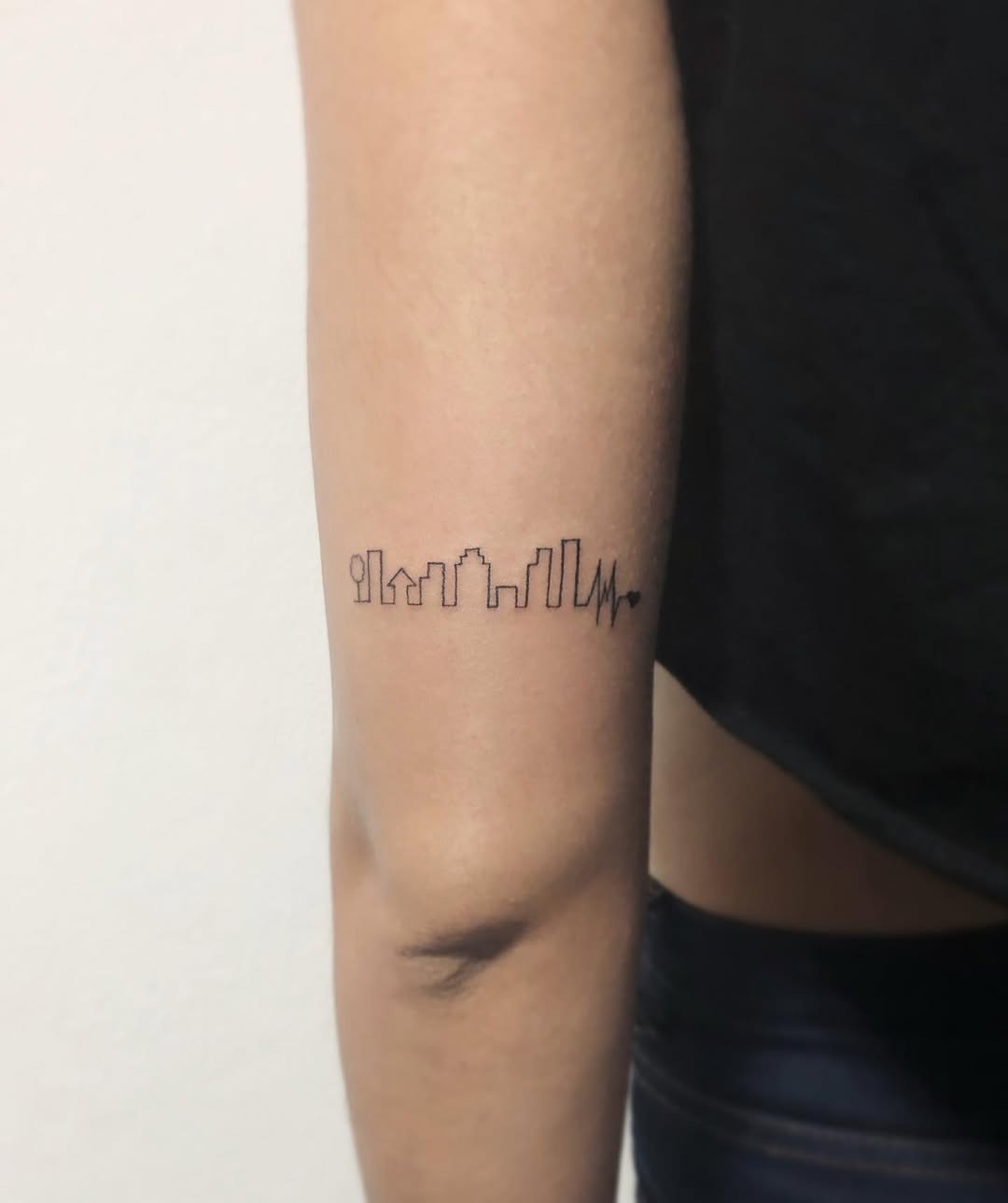 Stylish Skyline Tattoo with Heartbeat Line Tattoo Design