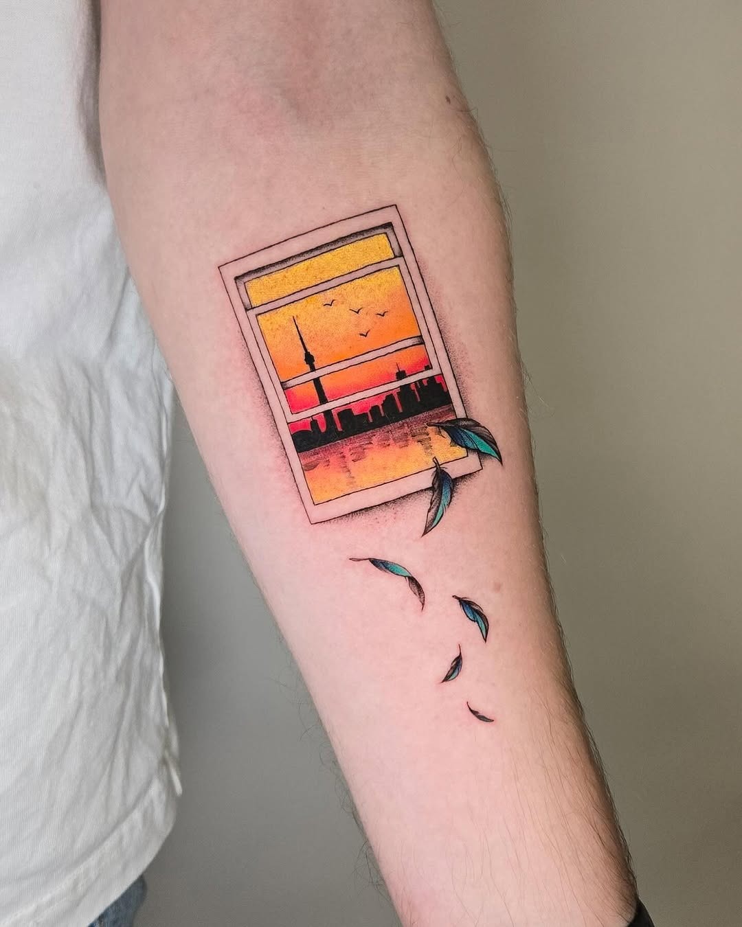 Vibrant skyline tattoo featuring sunset and birds Tattoo Design