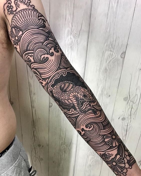 Circular Reptilian Floral Line Collage Sleeve Tattoo Tattoo Design