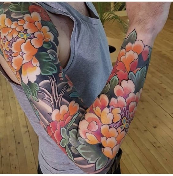 Full Floral Plant Sleeve Tattoo with Branch Tattoo Design