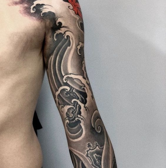 Gray Waves with Red Leaf Accent Sleeve Tattoo Ideas Tattoo Design