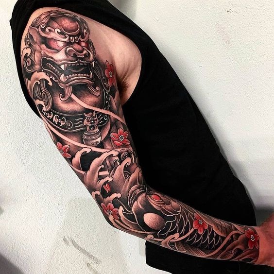 Jaguar and Scales Under Waves and Flowers Sleeve Tattoo Tattoo Design