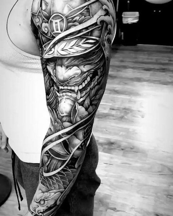 Pointy-Faced Man with Helmet and Thematic Framing Dragon Sleeve Tattoo Ideas Tattoo Design