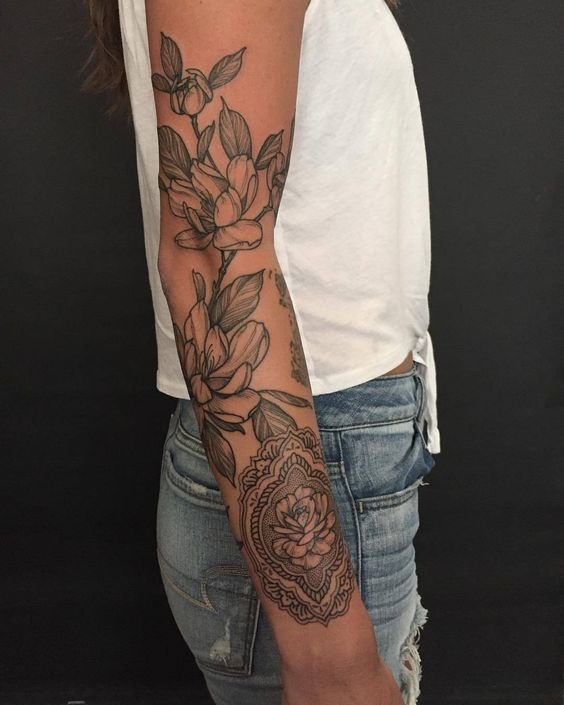 Snaking Lily Half Sleeve Tattoo with Wrist Brooch Tattoo Design
