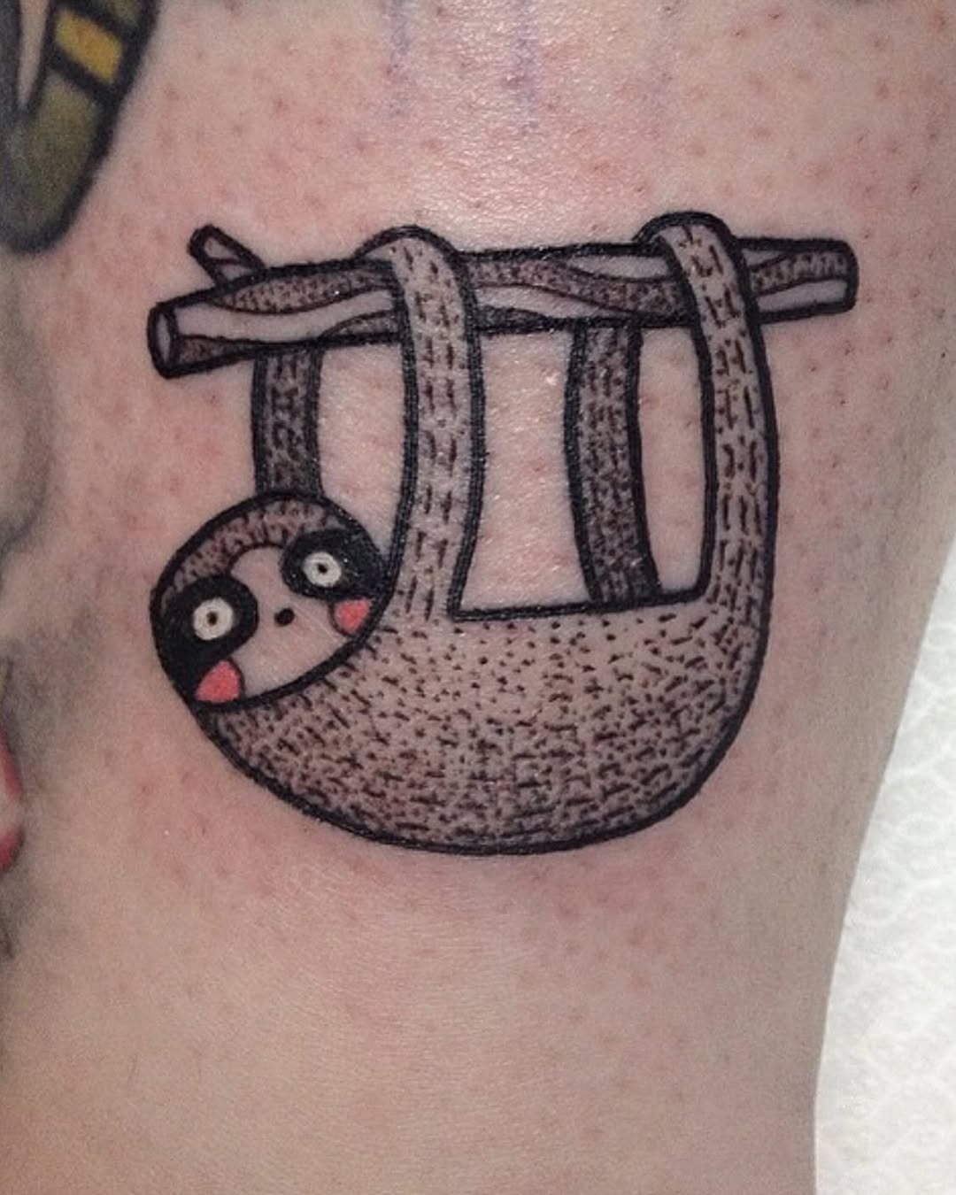 Adorable sloth tattoo hanging from a branch Tattoo Design