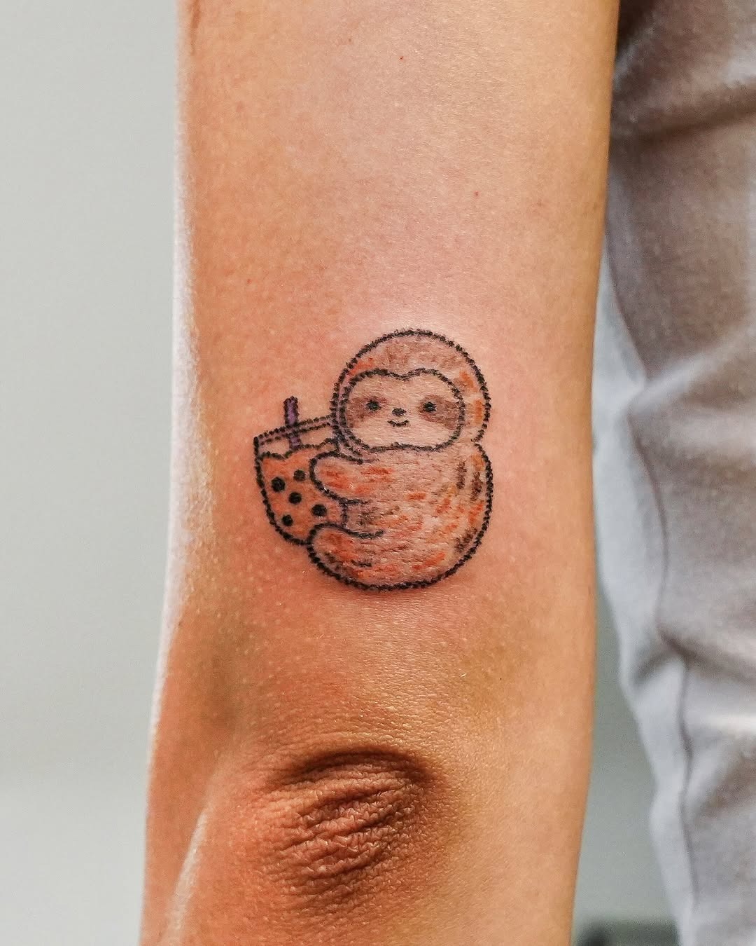 Charming sloth enjoying a bubble tea treat Tattoo Design
