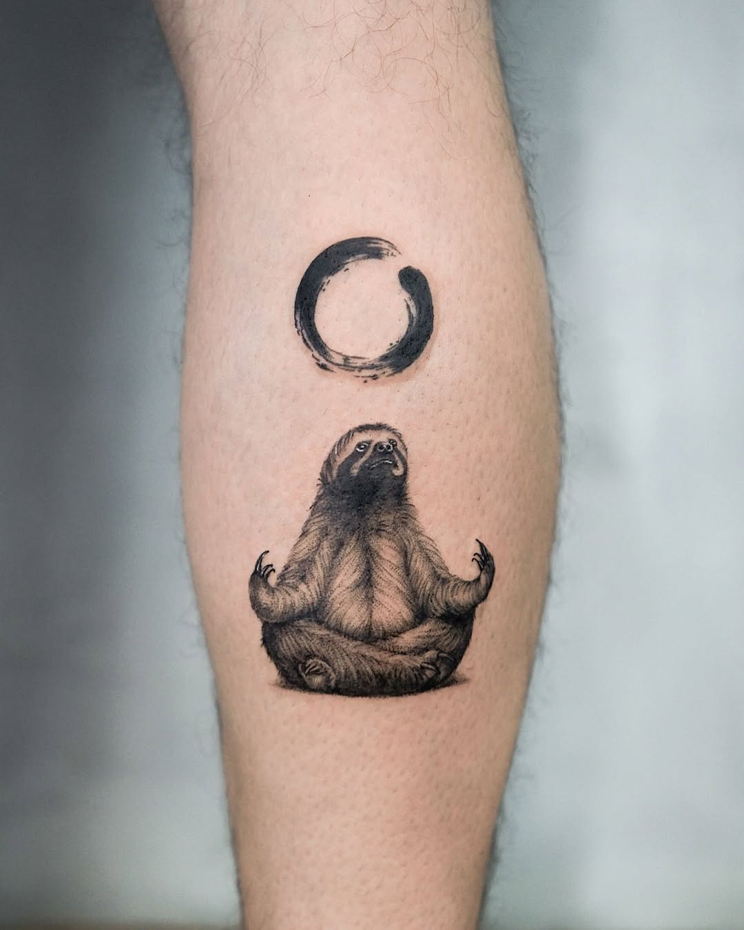 Serene Sloth in Meditative Pose Tattoo Design