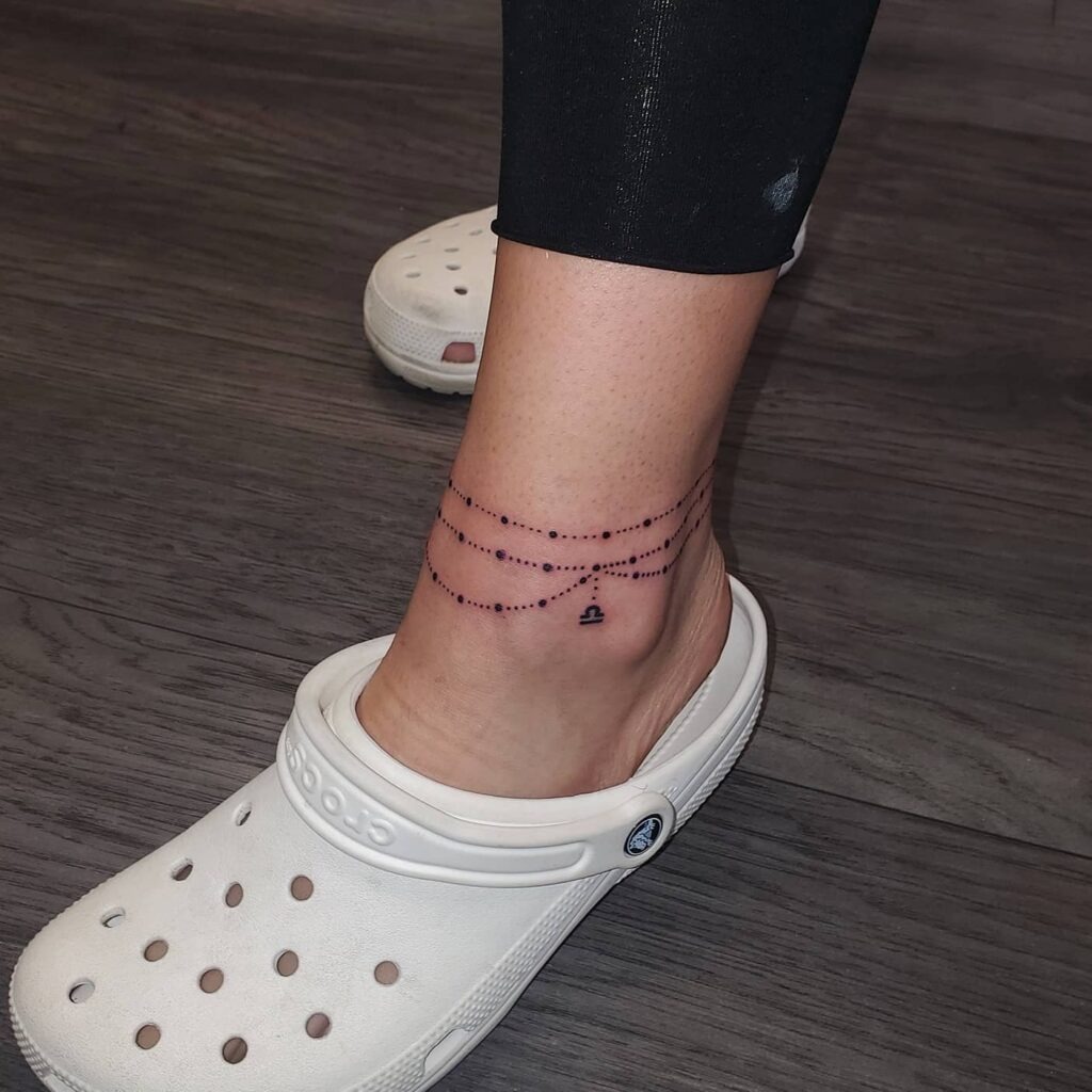 Dotted Chain Anklet Tattoo with Libra Symbol Tattoo Design