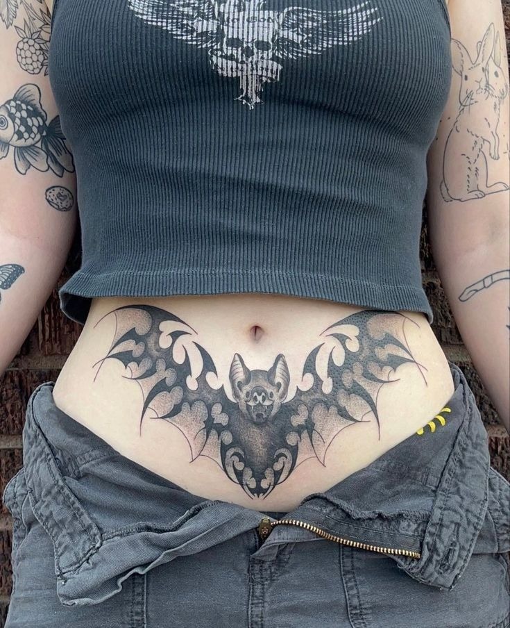 Bat-Inspired Gothic Belly Design Tattoo Design