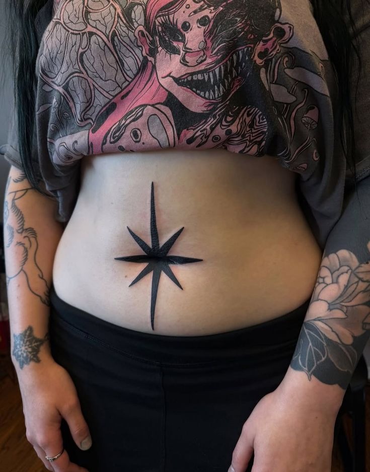 Bold Star Centerpiece Tattoo Design