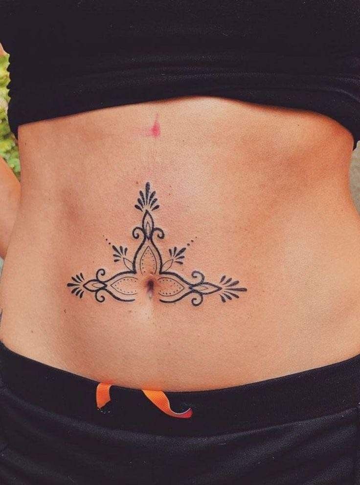 Ornamental Cross-Style Belly Detail Tattoo Design