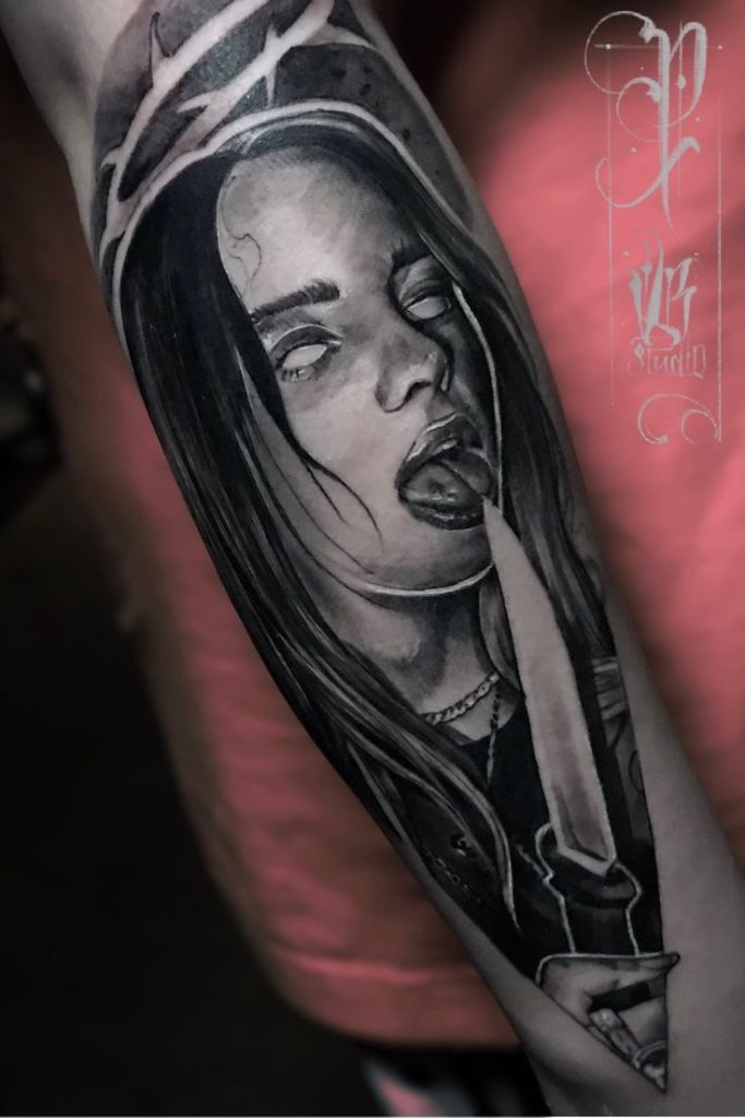 Eyes Rolled Back: Edgy Billie with Blade Tattoo Design