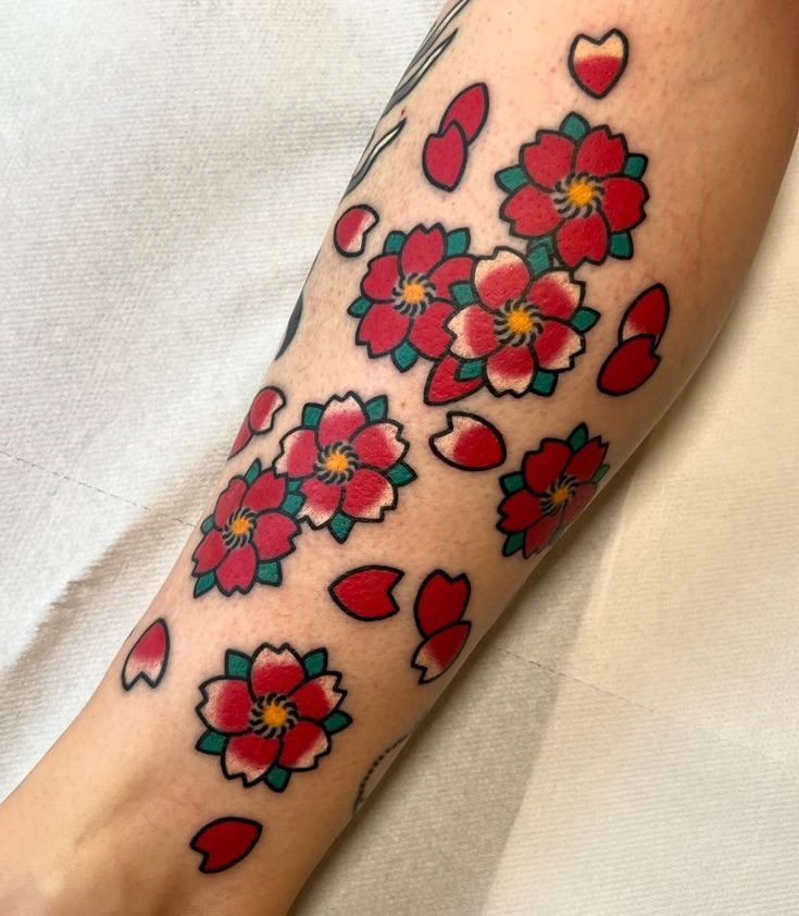 Traditional Japanese Cherry Blossom Tattoo with Bold Colors Tattoo Design