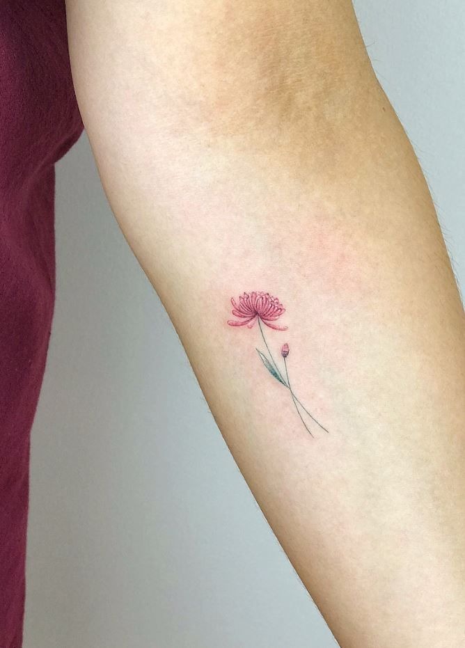 Tiny Pink Whisper on the Arm Tattoo Design