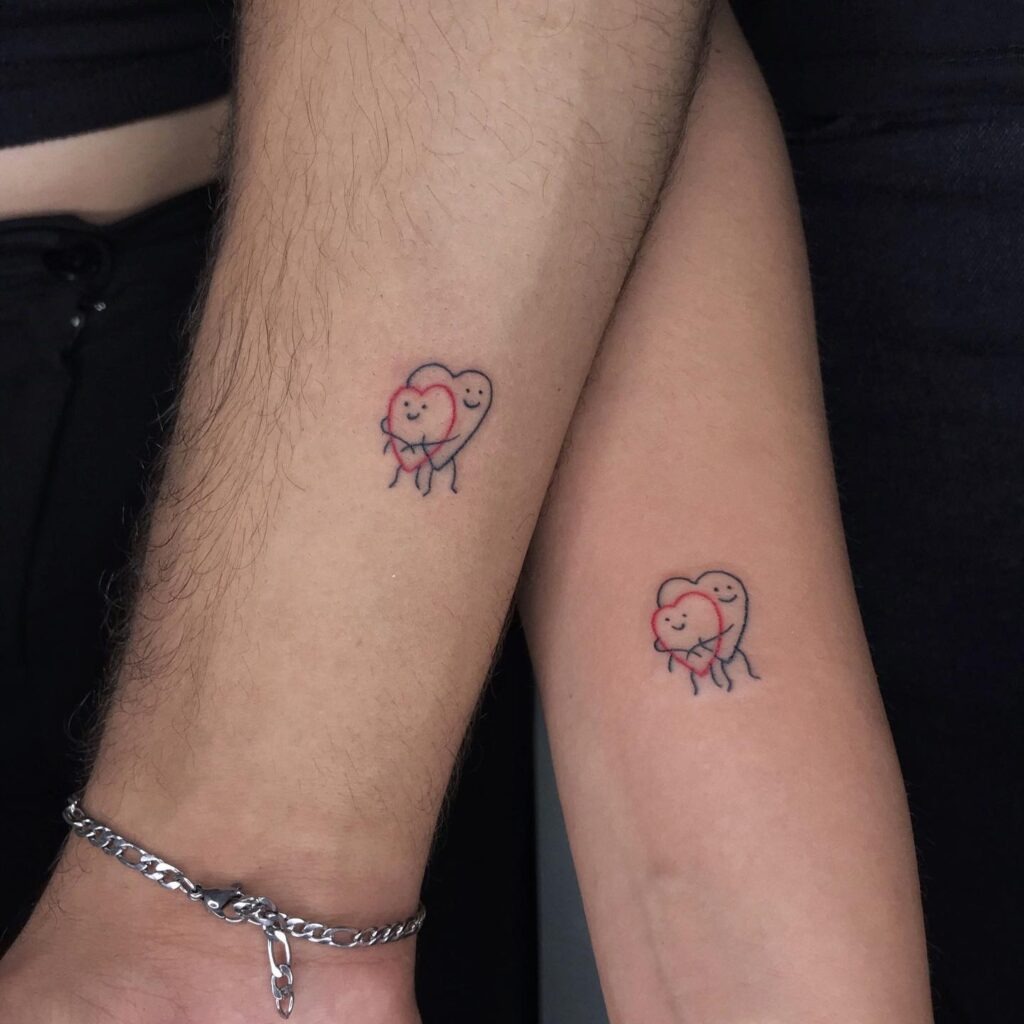 Hugging Hearts Couple Tattoos Tattoo Design