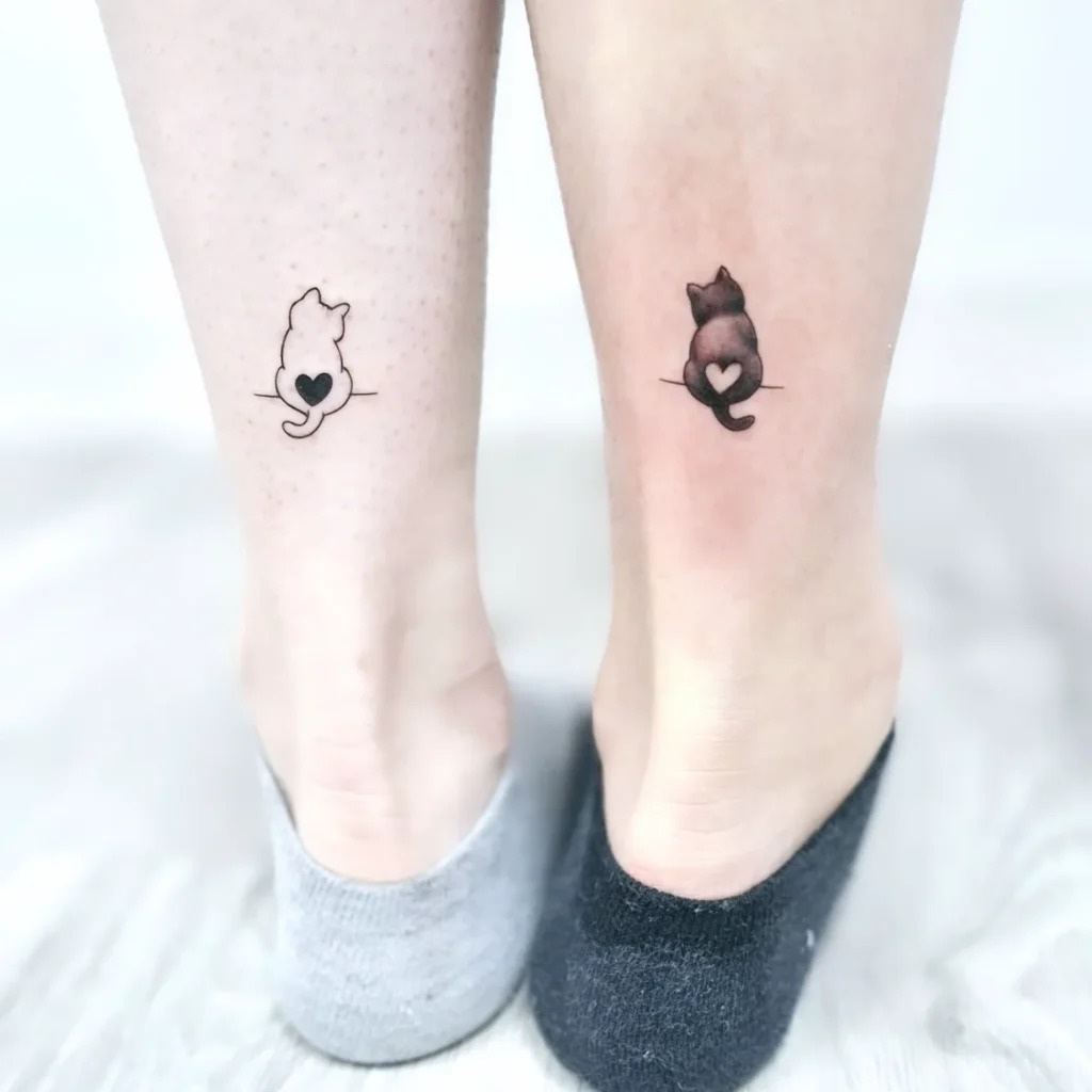 Matching Cat Silhouette Tattoos with Heart Detail Tattoo Design