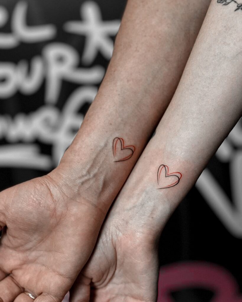 Red and Black Heart Couple Tattoos Tattoo Design
