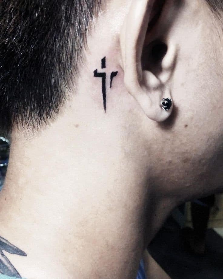 Bold Abstract Cross Behind the Ear Tattoo Design