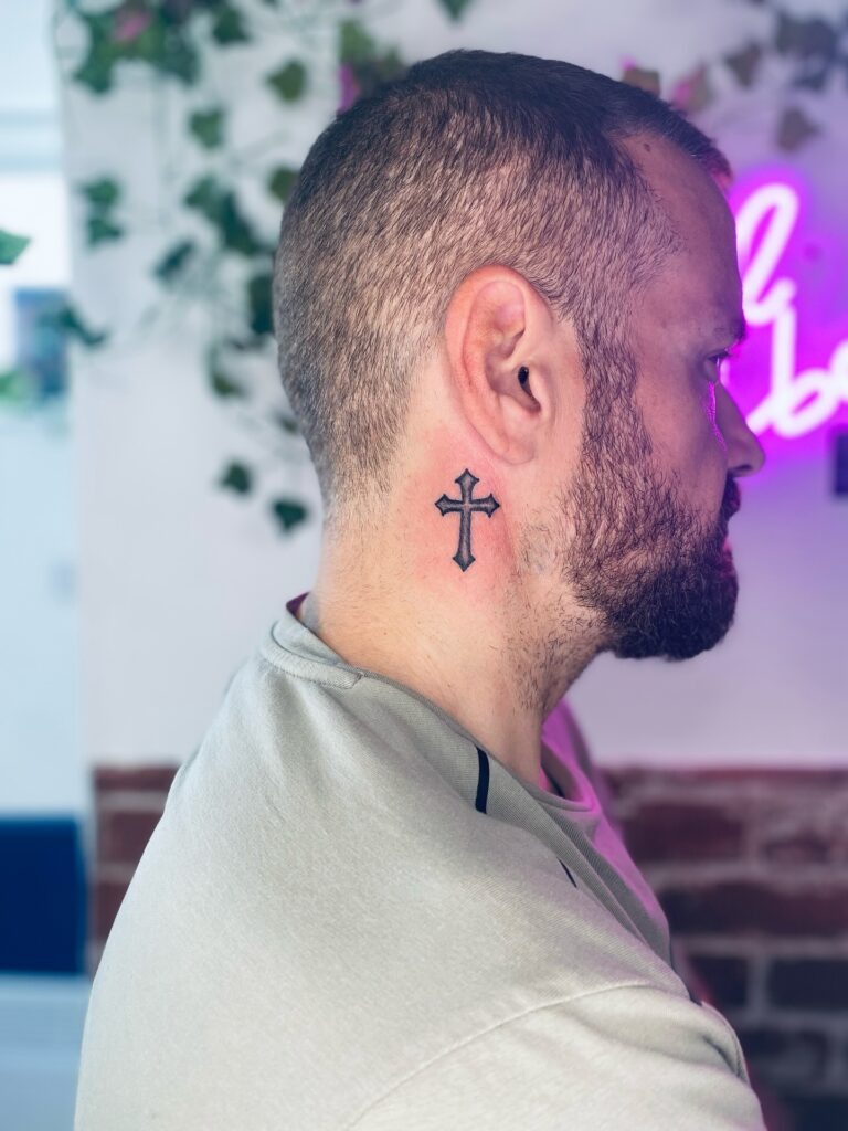 Classic Black Cross Behind Ear Tattoo Tattoo Design