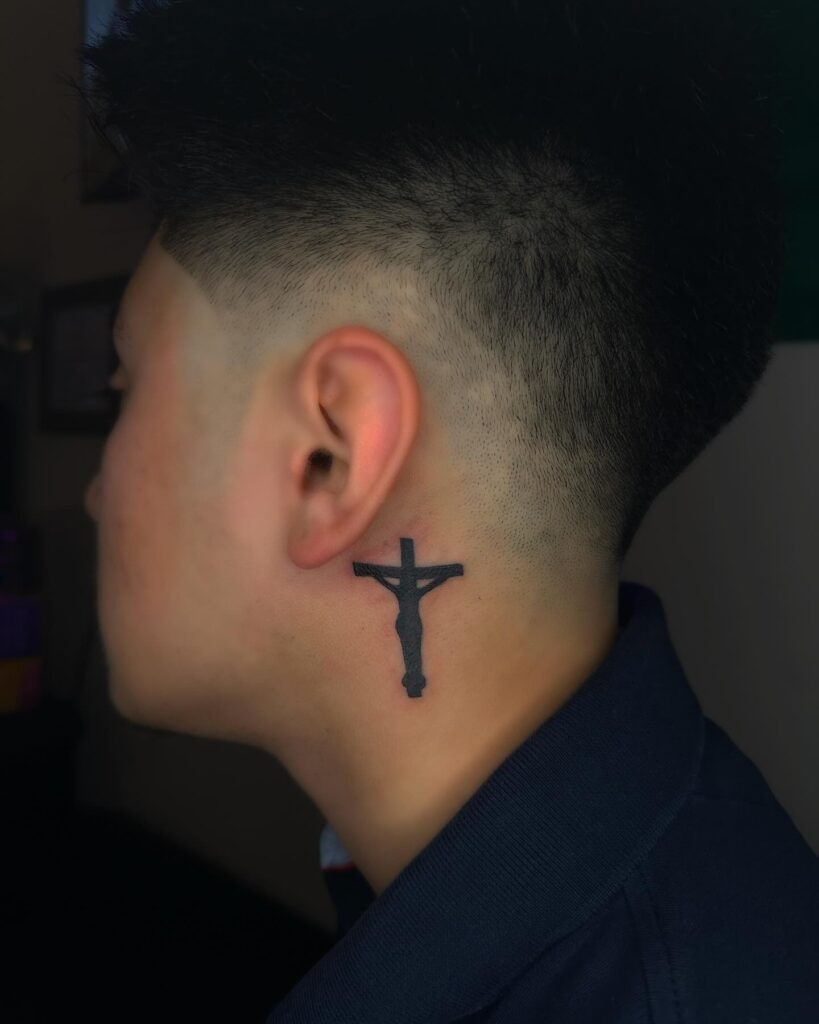 Crucifix Silhouette Behind Ear Tattoo Tattoo Design