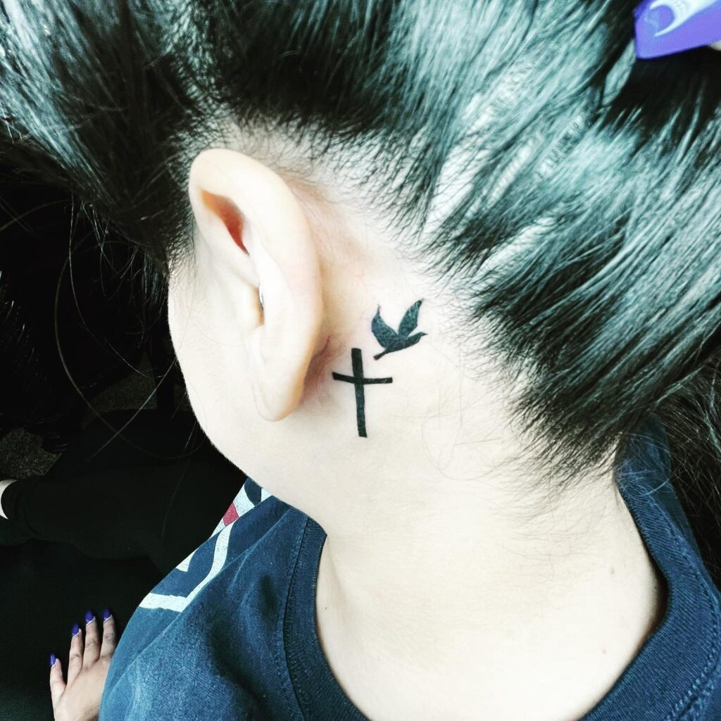 Memorial Cross and Dove Behind the Ear Tattoo Design