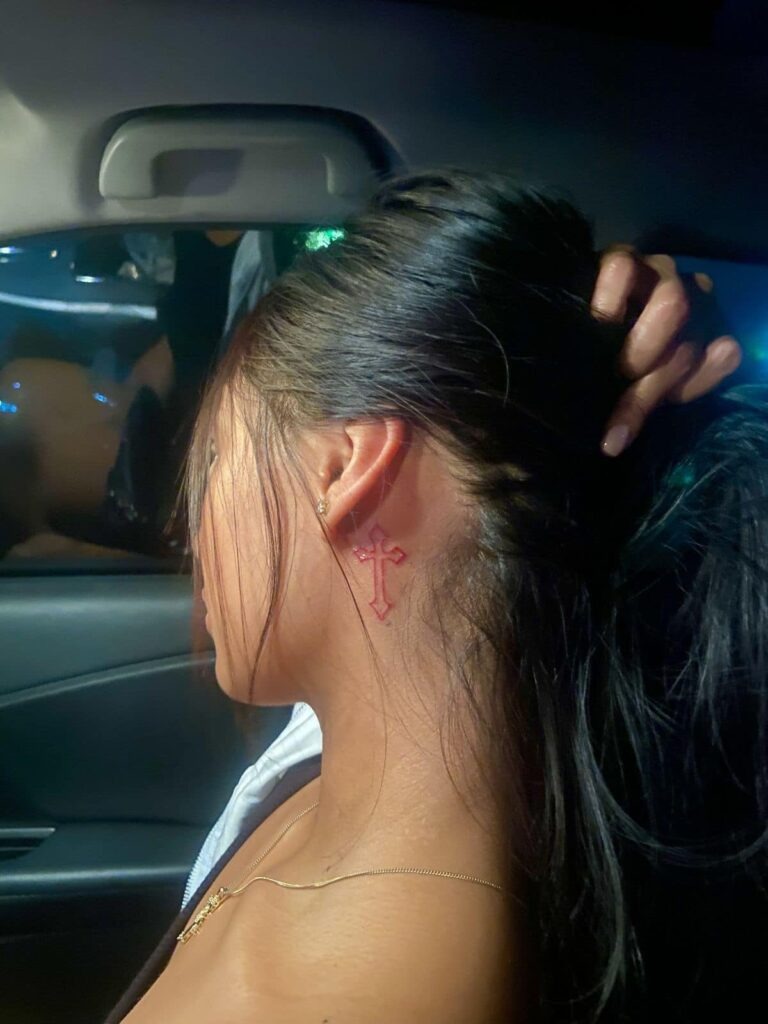 Red Ink Gothic Cross Behind the Ear Tattoo Design