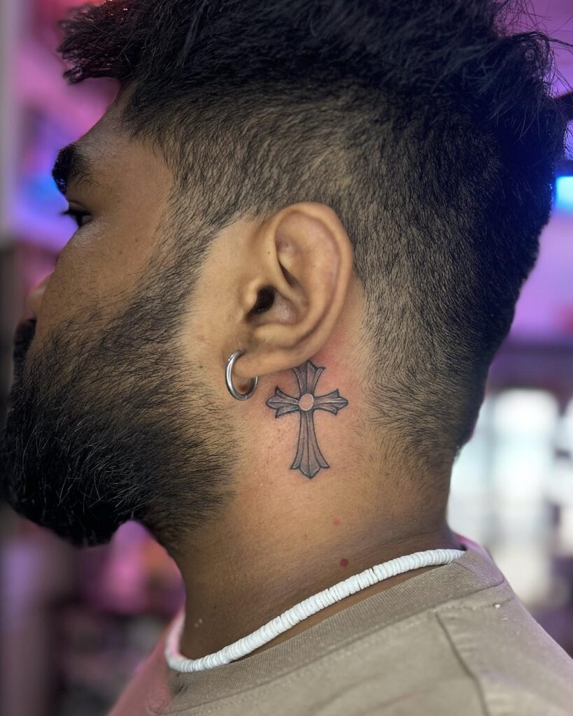 Shaded Ornamental Cross Behind Ear Tattoo Tattoo Design