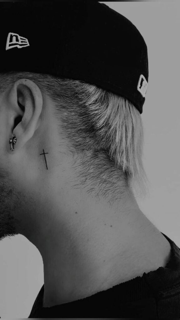 Simple Mini Cross Behind the Ear Tattoo Design