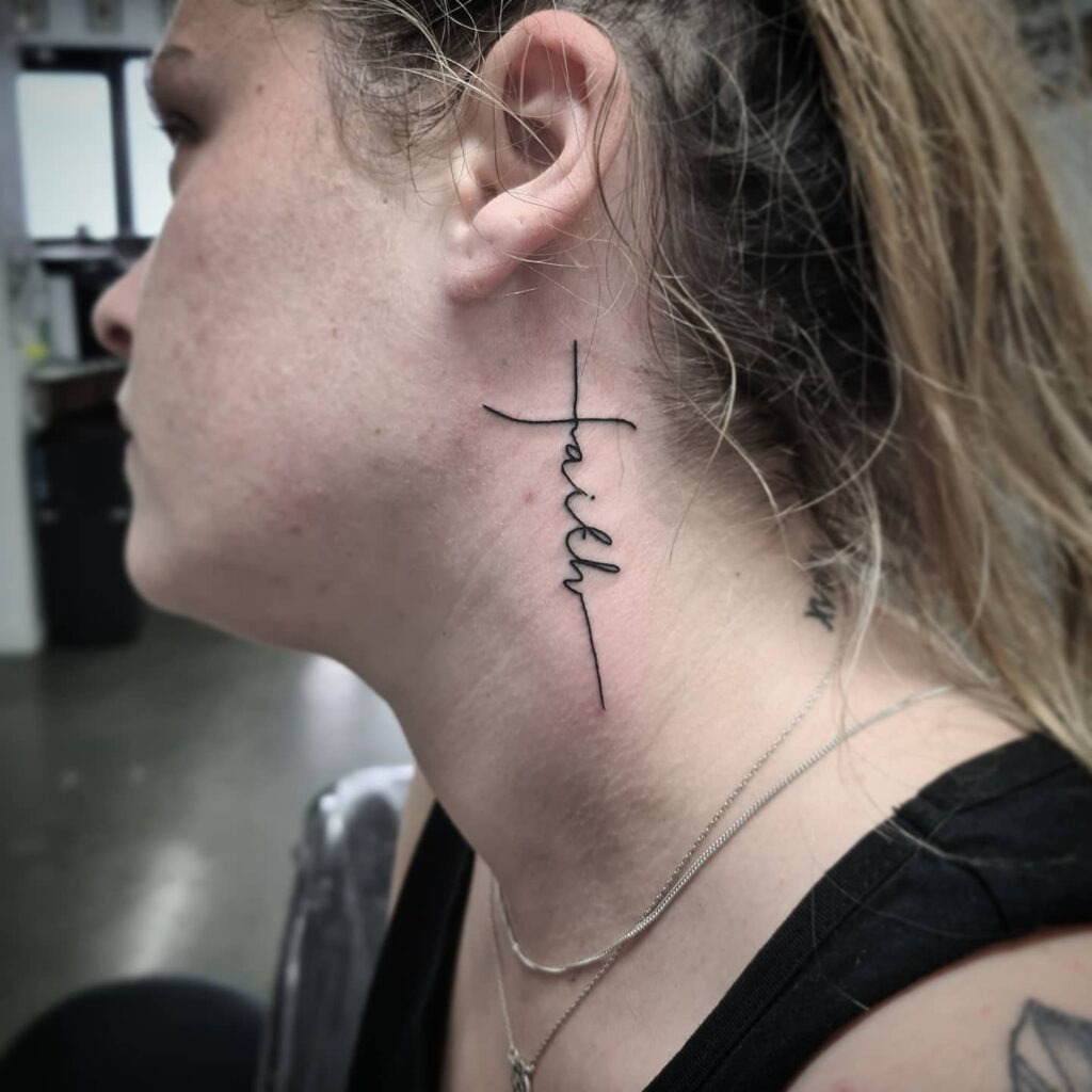 Vertical Faith Script Behind the Ear Tattoo Design