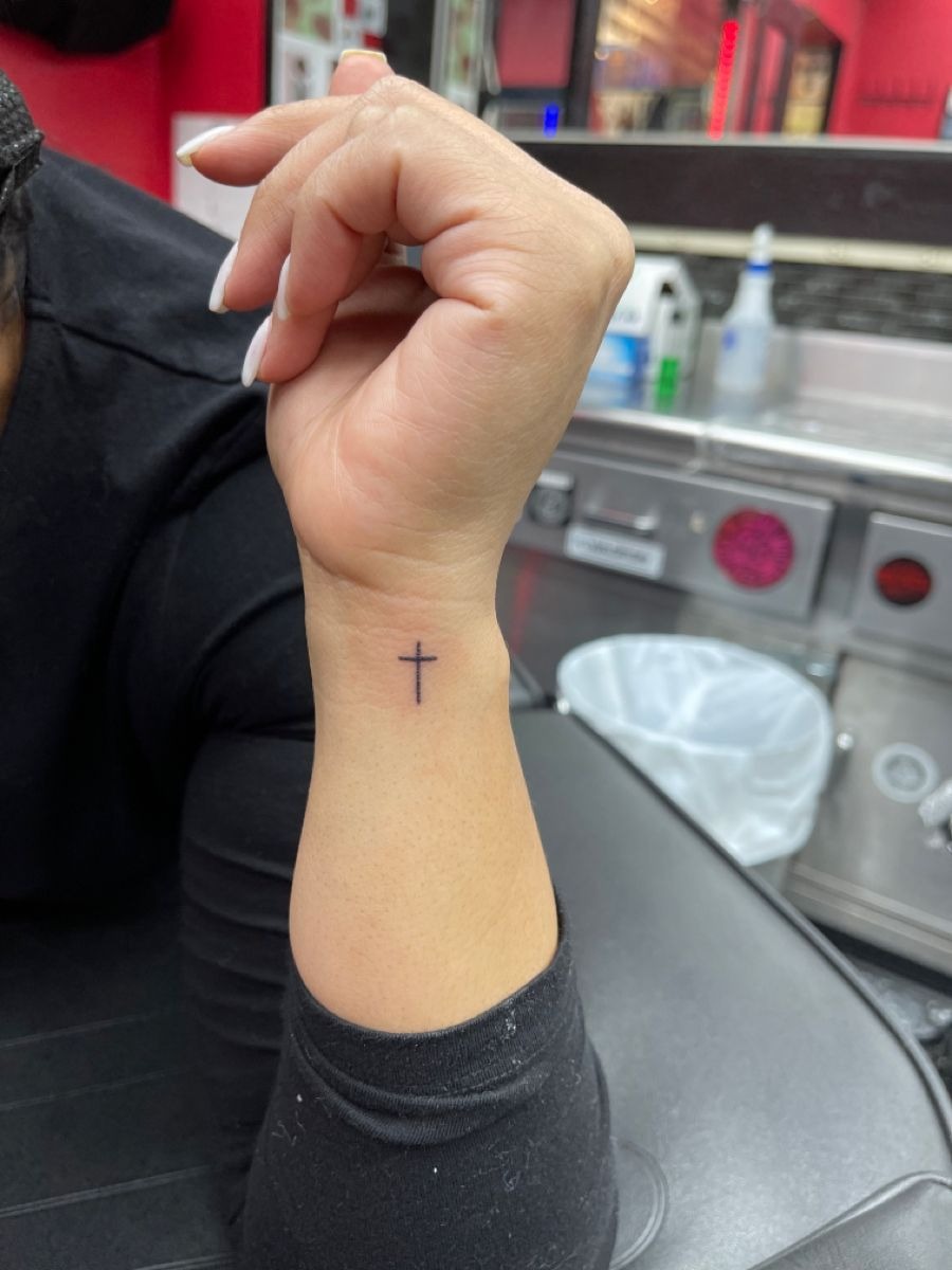 Classic Small Cross on Inner Wrist Tattoo Design