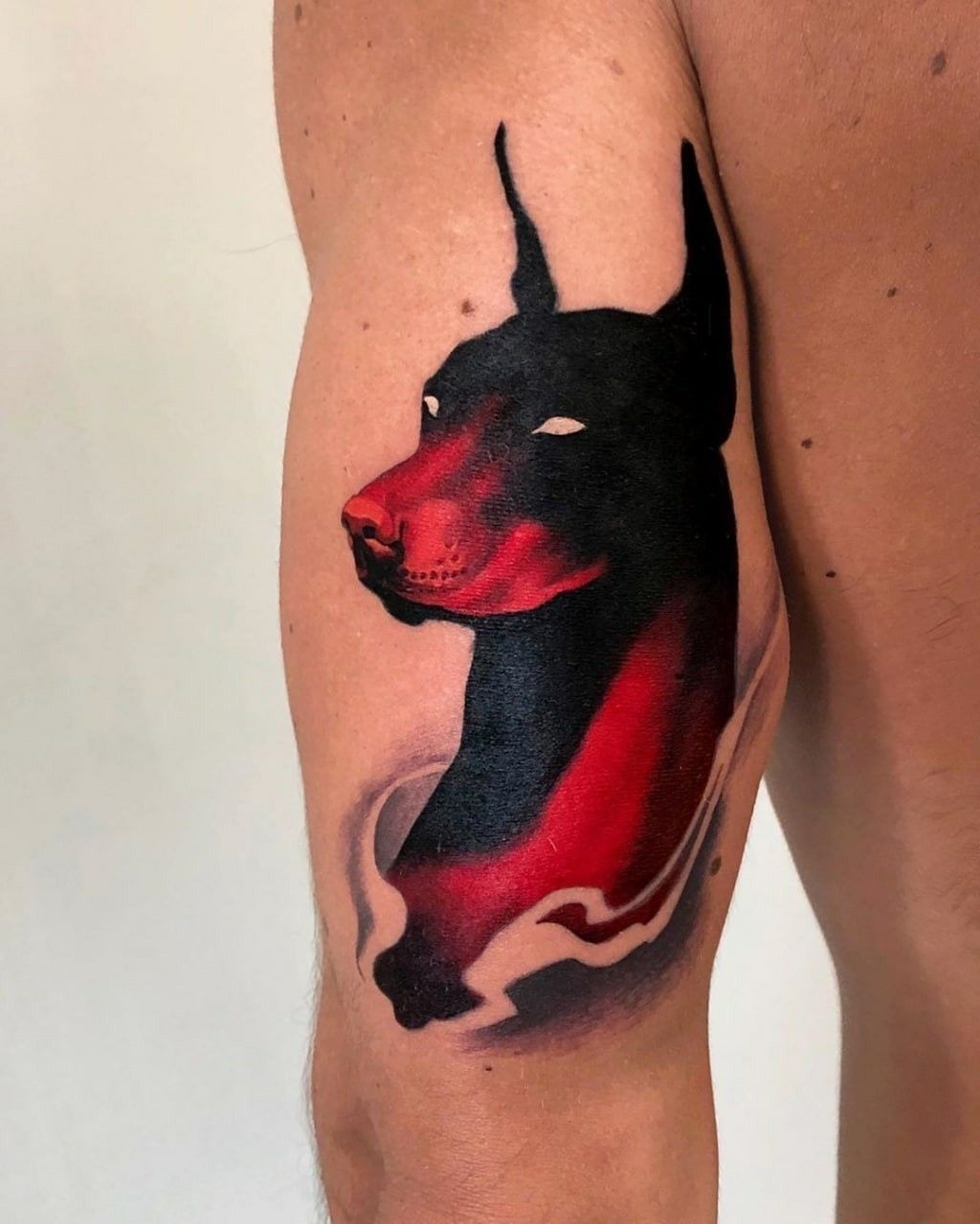 Crimson Glow Realistic Head Tattoo Design