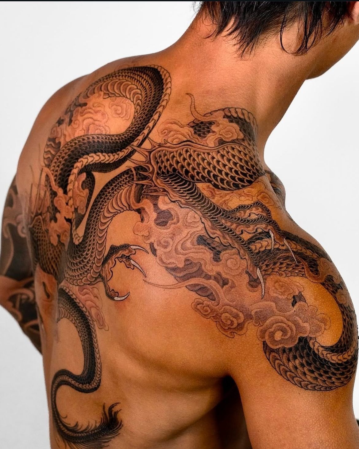 Large Traditional Japanese Dragon Shoulder Wrap, a tattoo design rendered in bold traditional.