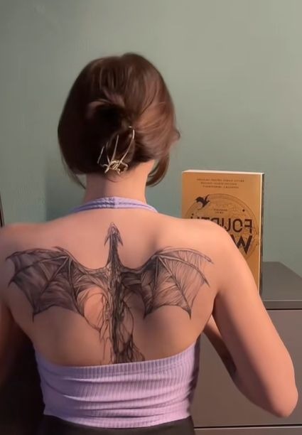 Symmetrical Double Wing Back Design, a tattoo design rendered in clean detailed linework for the shoulder.