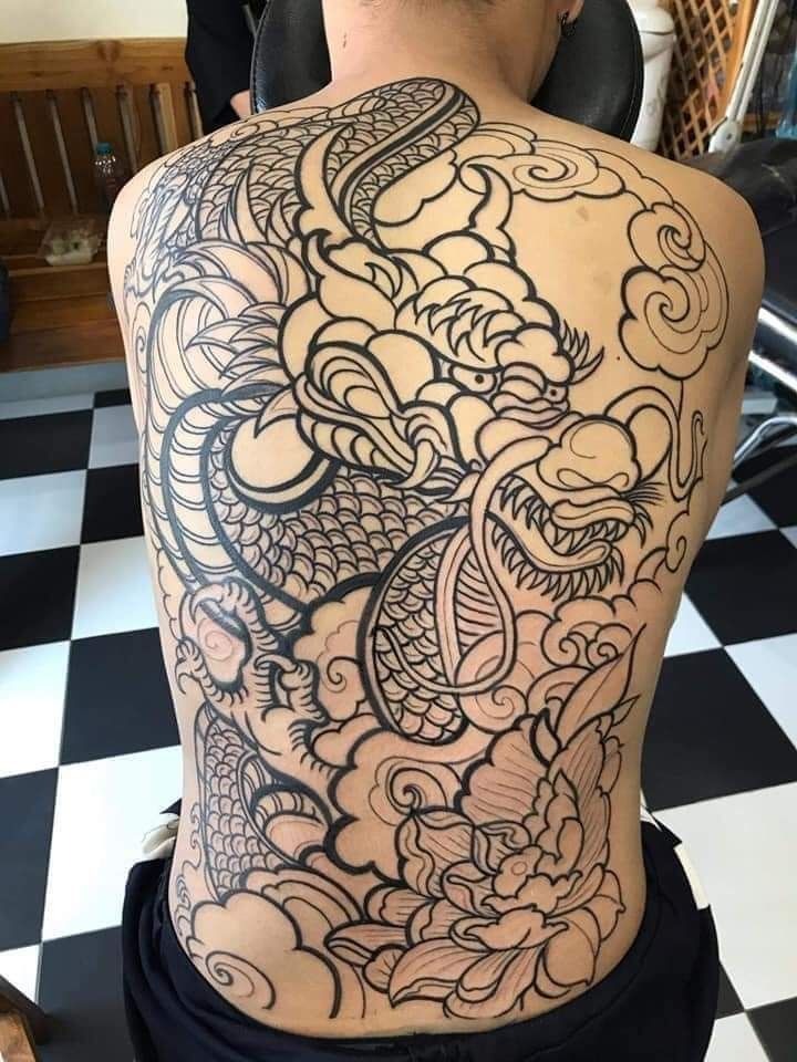 Traditional Japanese Outline Dragon, a tattoo design rendered in bold traditional.