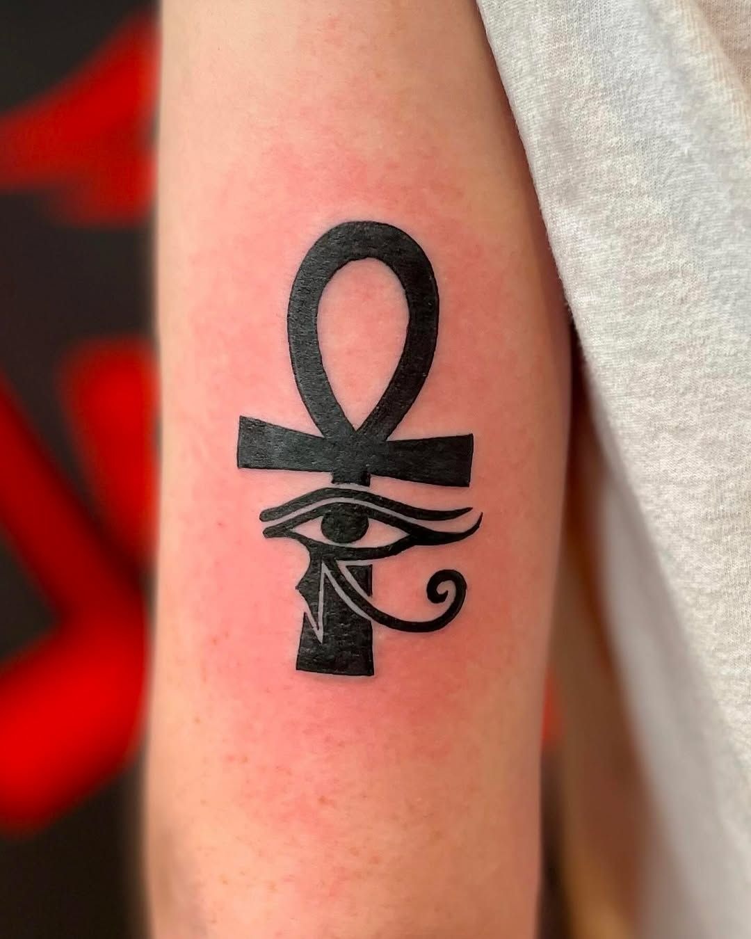 Bold Ankh and Eye Upper Arm Tattoo Tattoo Design