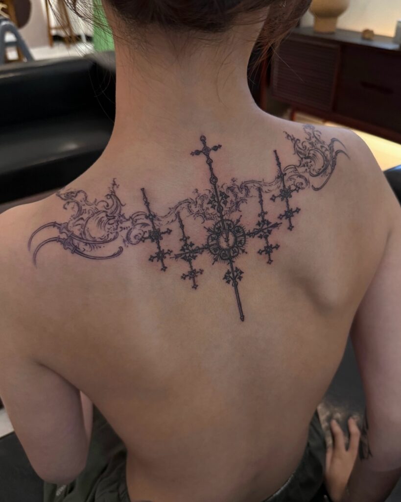 Ornamental Cross and Filigree Back Tattoo Tattoo Design
