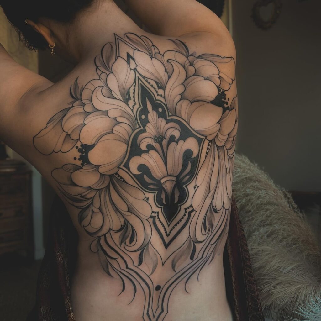 Ornamental Full Back Tattoo with Flowing Florals Tattoo Design