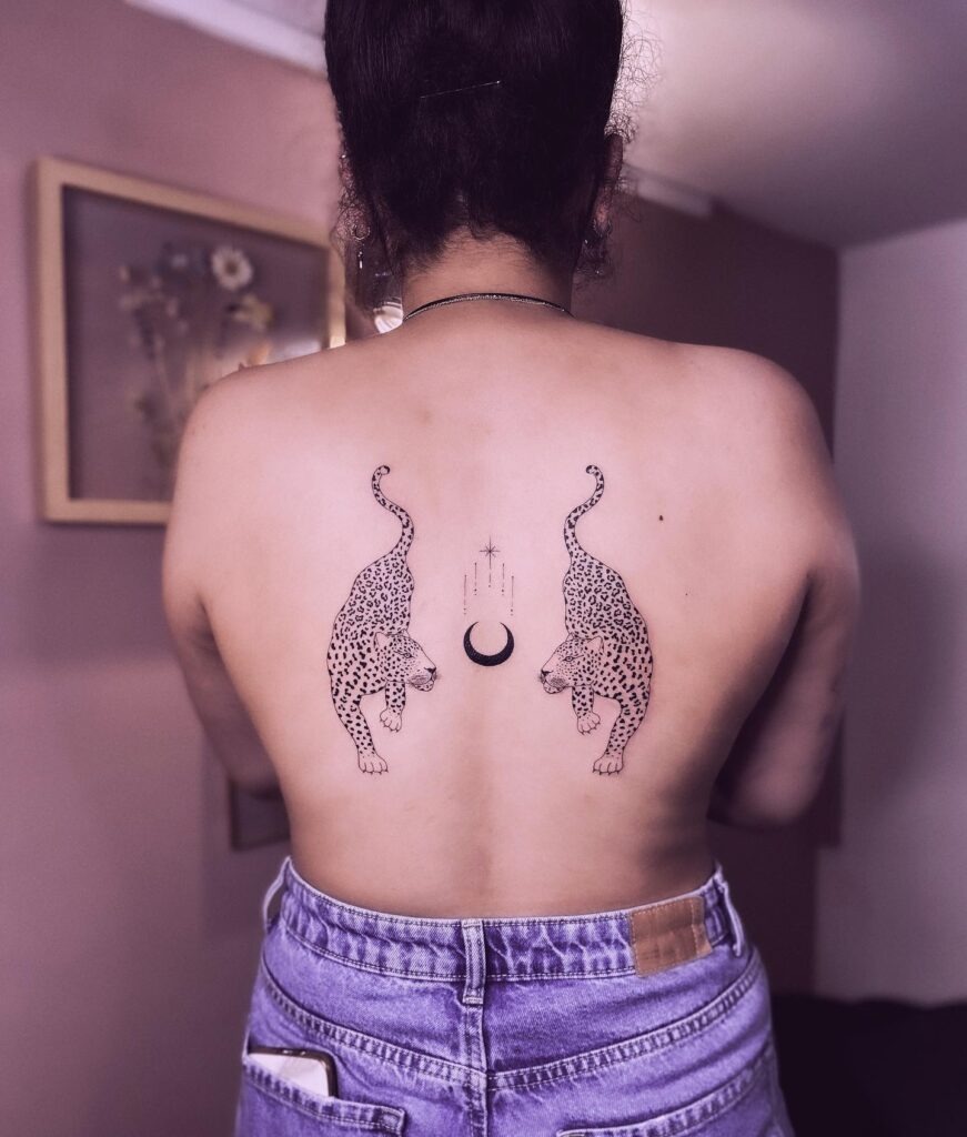 Twin Leopards with Celestial Accents Tattoo Design